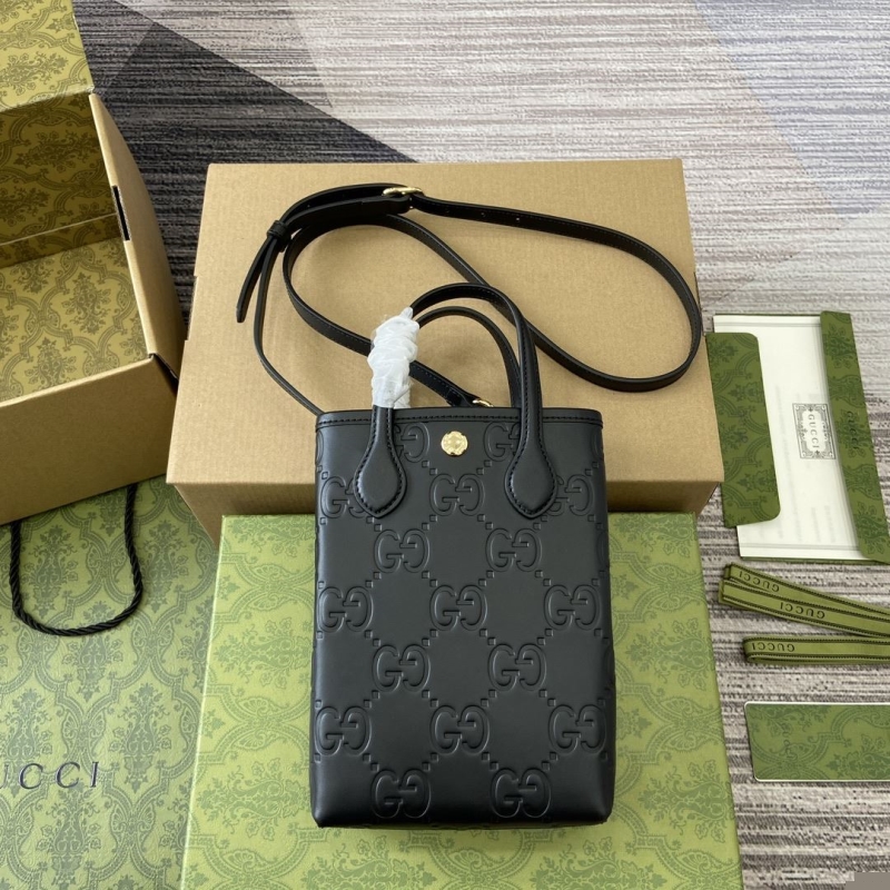 G*u*i top handle bags